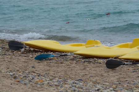 Water sport equipment - kayak on the beach, vacation leisureの写真素材