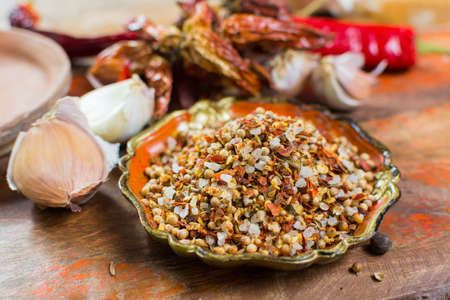Harissa blend spice with coriander, chili pepper, garlic, salt used in African, Morocco, Middle East...