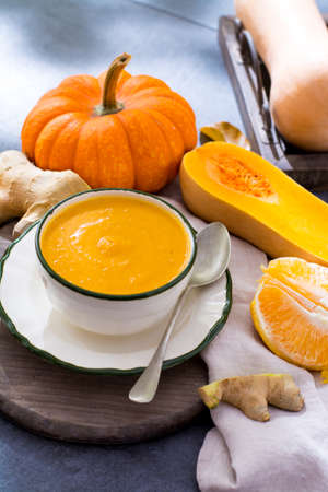 Homemade pumpkin cream soup made from fresh ripe bottle gourd pumpkinの写真素材