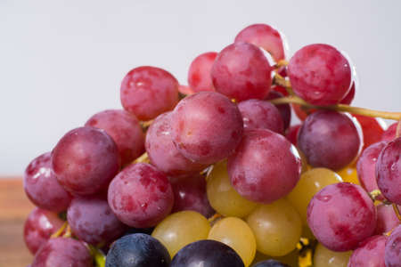 Large organic table grape Globe in assortment served on the tin plate close upの写真素材