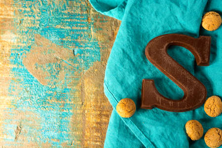 Traditional Dutch Saint Nicolas celebration with presents for children in December, Saint Nicolas chocolate letters and spicy cookies close upの写真素材