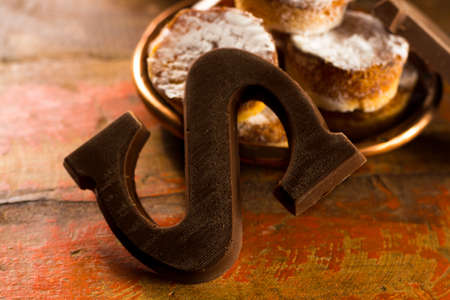 Traditional Dutch Saint Nicolas celebration with presents for children in December, Saint Nicolas  gift bag and chocolate letters close upの写真素材