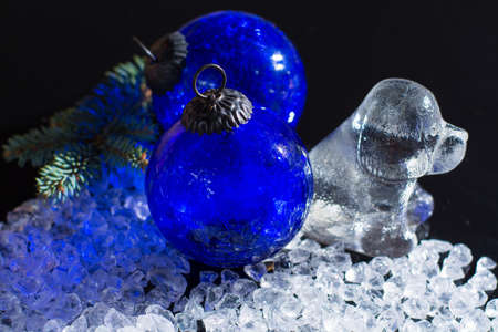 Black and white, Chine horoscop, 2018 New Year of dog, glass dog figure and clbalt blue ball, copy spaceの写真素材
