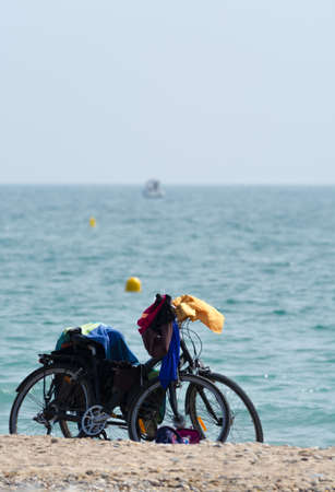 Sport equipment for active people - bicycles on the beach, vacation leisureの写真素材