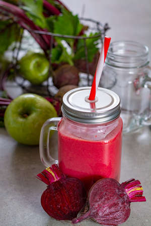 Healthy dietary detox food, fresh smoothie frim young red beets and appleの写真素材