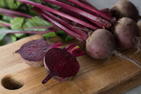 Young raw red beets roots with leaves, new harvestの写真素材