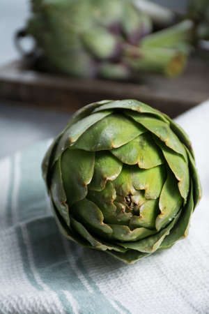 Green ripe raw big artichokes heads ready to cookの写真素材
