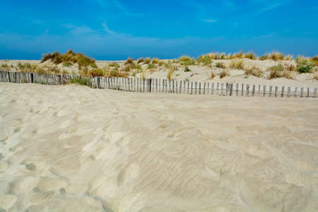Nice white sand beach at Le Grau du Roi,  France's Languedoc coast, is known as Plage de...