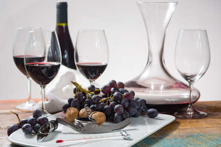 Professional red wine tasting event with high quality wine glasses and wine accessories close upの写真素材