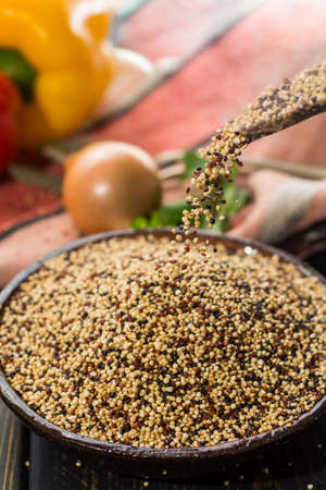 Mix of organic white, yellow and black quinoa, dietary and healthy food, close upの写真素材