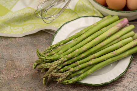 Bunch of uncooked green asparagus, tasty vegetarian foodの写真素材