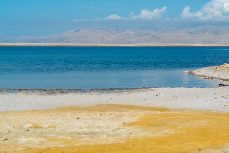 Lowest salty lake in world below sea level Dead sea, full of minerals near luxury vacation resort Ein Bokek, perfect place for medical treatments, climatotherapy, thalassotherapy and heliotherapy.