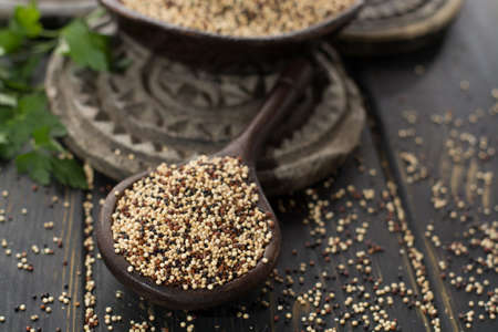 Mix of organic white, yellow and black quinoa, dietary and healthy food, close upの写真素材