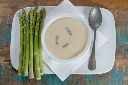 Seasonal fresh homemade asparagus soup made from white and green asparagus, healthy  vegetablesの写真素材