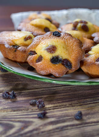 Traditional French butter muffins stars with raisins, tasty dessertの写真素材