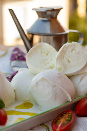 Fresh soft Italian white cheese mozzarella buffalo, original from Campania, Paestrum and Foggia...