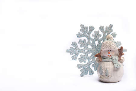 Two decorative snowmen copy space isolated white background, Christmas holidays postcard conceptの写真素材