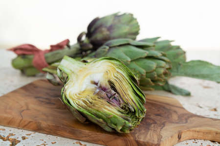 Traditional Italian food, fresh green artichoke vegetables, new harvest, uncookedの写真素材