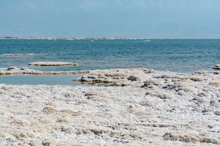 Lowest salty lake in world below sea level Dead sea, full of minerals near luxury vacation resort...