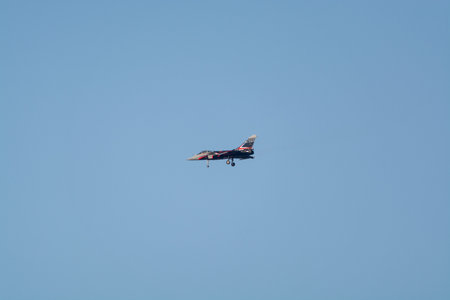 15 August 2018, France, city Toulon, French Air Force Rafale C fighter with red wings pictured during air show in Toulon radeのeditorial素材