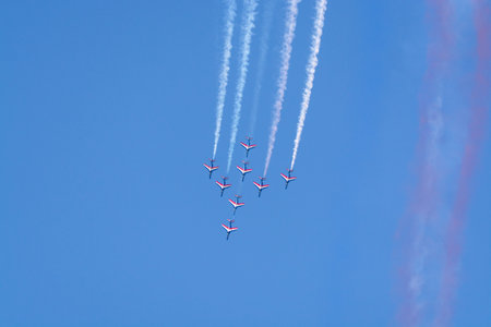 Toulon, FRANCE - August 15, 2018: Patrouille de France aerobatics team, famous demonstration of French Air force, Alpha jets of Patrouille de France in full formation.のeditorial素材