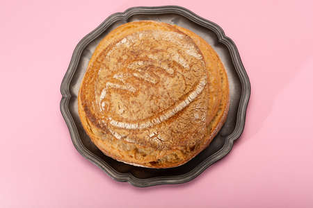 Sourdough homemade round white wheat bread close up