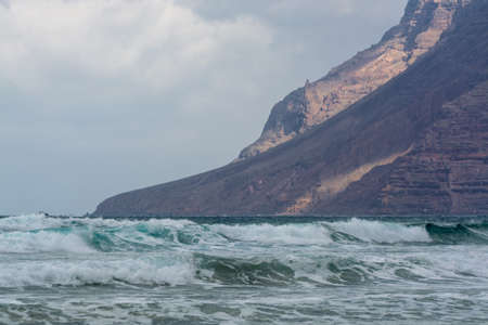 Water of Atlantic ocean, winter on Lanzarote island, Famara beach, famous destination for surfers...