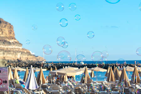Winter sun travel destination, ocean coastline with rocks near Puerto Mogan, Gran Canaria, Canary...