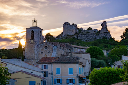 View on traditional medieval houses and castle ruines in Provence during sunrise, South of France, vacation and tourist destinationのeditorial素材