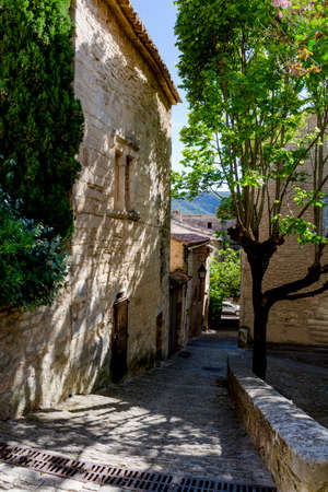 View on traditional and medieval houses in Provence in sunny day, South of France, vacation and tourist destinationの写真素材