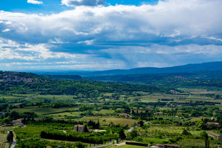 Landscape with fruitful Luberon valley in Provence, South of France, view in summerの写真素材