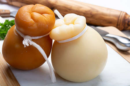 Cheese collection, Italian provolone or provola caciocavallo hard and smoked cheeses in teardrop...