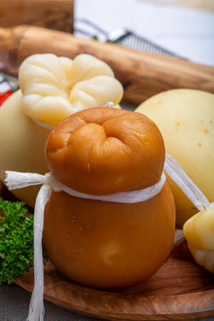 Cheese collection, Italian provolone or provola caciocavallo hard and smoked cheeses in teardrop...