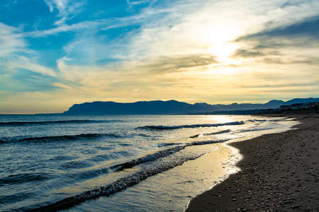 Coastline with sandy beaches and clear sea water in Alcamo Marina, small town in Sicily, Italy, summer vacation destinationの写真素材
