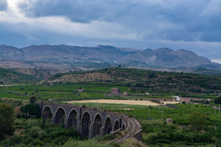 Landscape with mountain range on Sicily island, South of Italy, travel destinationの写真素材