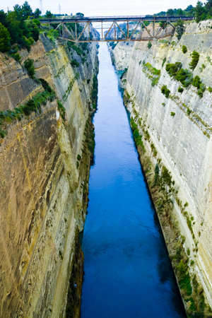 Old waterway in Greece, Corinth  Canal connects Gulf of Corinth with the Saronic Gulf in the Aegean Sea, tourist attaractionの写真素材