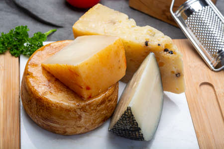 Cheese collection, Variety of Italian pecorino cheeses, aged with black peppers from Nebrodi, white...