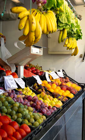 Fresh harvested fruits and vegetables from farmer for sale on weekly spanish market in Andalusia, Spain, close upの写真素材