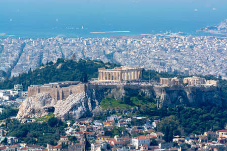 Athens, capital of Greece, in spring, view from hill,  cityscape with Acropolis, streets and...