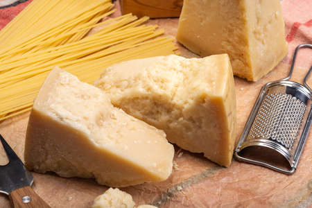 Cheese collection, hard italian cheese, aged parmesan and grana padano cheese  close upの写真素材