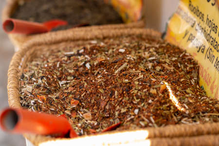 Assortment of herbal aromatic tea blends in tea shop close upの写真素材