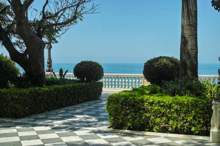 Beautiful parks with ocean view in one of oldest city in Europe, Cadiz, Andalusia, Spain in summerの写真素材