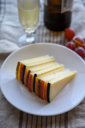 Cheese collection, variety of Spanish manchego cheese made from cow and goat milk close upの写真素材