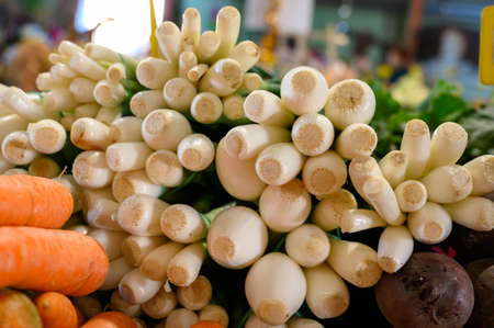 Fresh organic green onion for sale on Sunday farmers market on Tenerife, Canary islands, Spainの写真素材