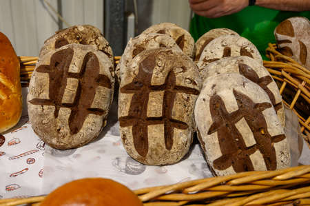 Fresh baked bread from artisanal bakery on farmers market, Tenerife, Canary islands, Spain close up