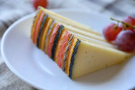 Cheese collection, variety of Spanish manchego cheese made from cow and goat milk close upの写真素材