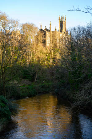 View on old Gothic church near Dean village in New Town part of Edinburgh city, capital of Scotland, in sunny winter dayの写真素材