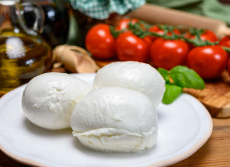 Cheese collection, white mozzarella cheese balls for salad or for appetizer snacks from italian deli shop in New York, USAの写真素材