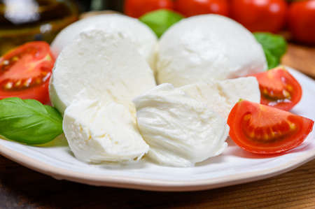 Cheese collection, white mozzarella cheese balls for salad or for appetizer snacks from italian deli...