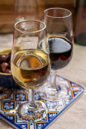 Close up tasty  fortified wine from Andalusia, Spain, different types of sherry in glasses and...